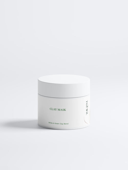A white cosmetic jar labeled 'CLAY MASK' with a matching lid, photographed on a clean white background with a soft shadow.